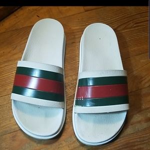 Gucci slides and retro 13s